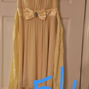 Elegant Cream Dress with Bow Detail